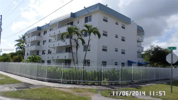 a view of a building with a garden