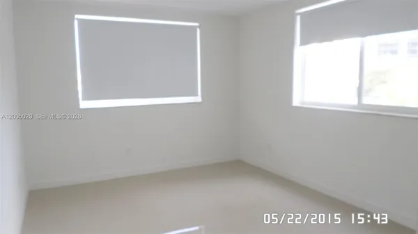 a bathroom with a sink and vanity