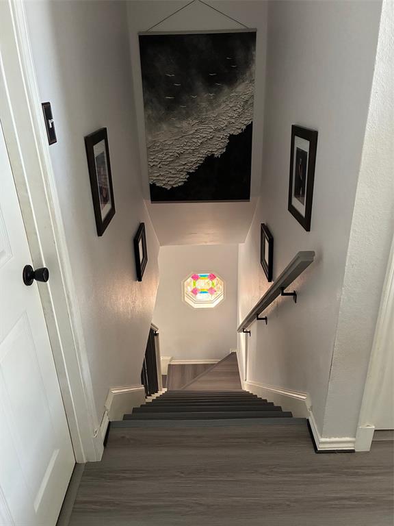 11607 Harbor Road Frisco, TX 75035 - Photo 9 of 10 a view of entryway and hall with wooden floor