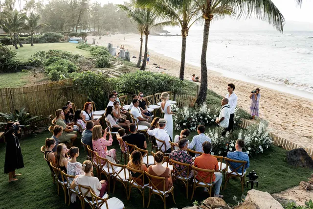 a view of swimming pool with outdoor seating and green space