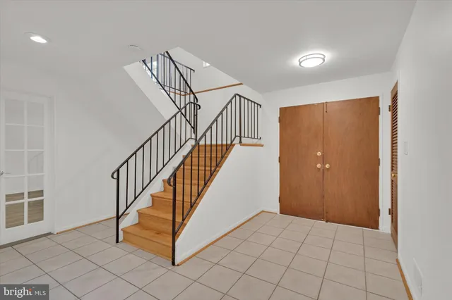 a view of a hallway with staircase