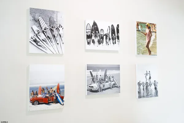a painting on the wall with a picture on the wall