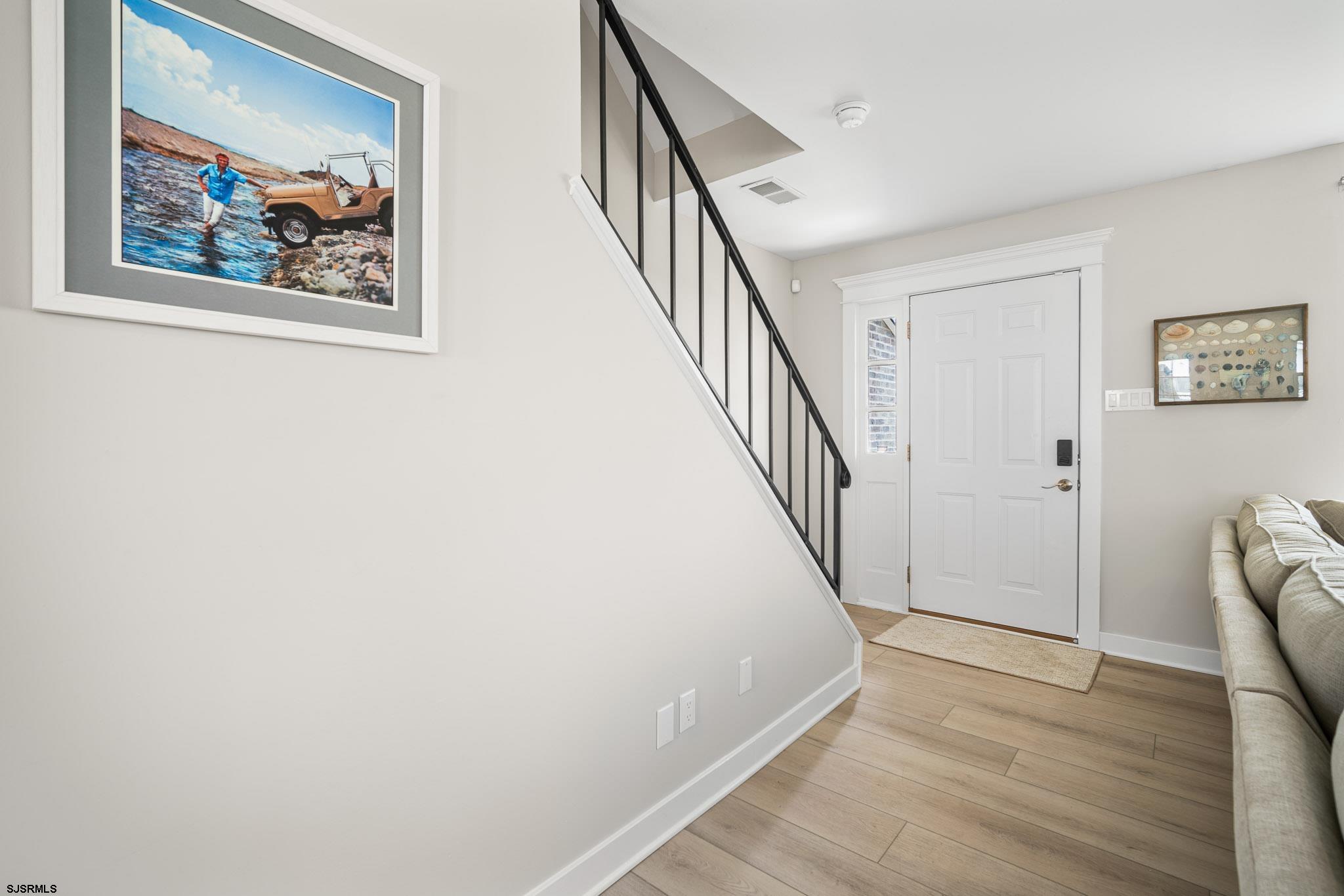 5217 Seaspray Road Brigantine, NJ 08203 - Photo 7 of 35 a view of a hallway with interior of the house