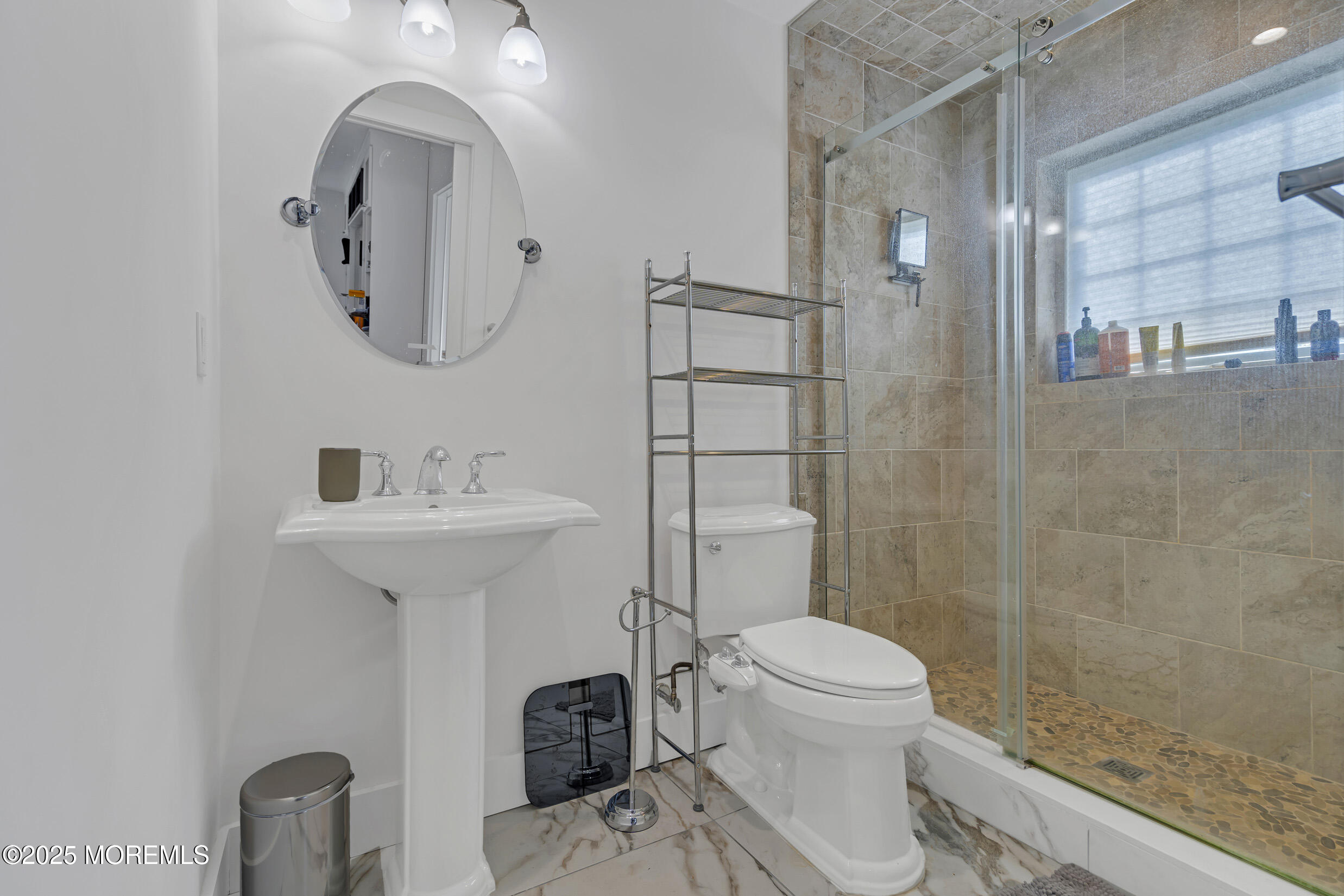 194 Mantoloking Road Brick, NJ 08723 - Photo 54 of 76 a bathroom with a sink toilet and shower