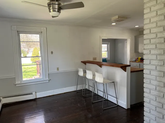 a bed room with a bed and a window