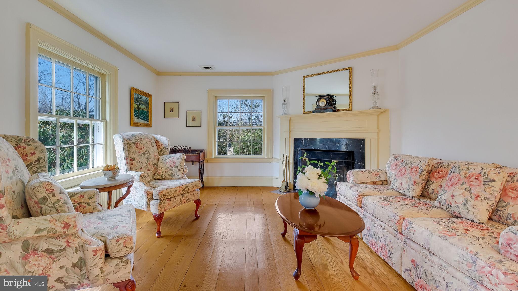 563 Pebble Hill Road Doylestown, PA 18901 - Photo 13 of 82 Formal living room with corner fireplace