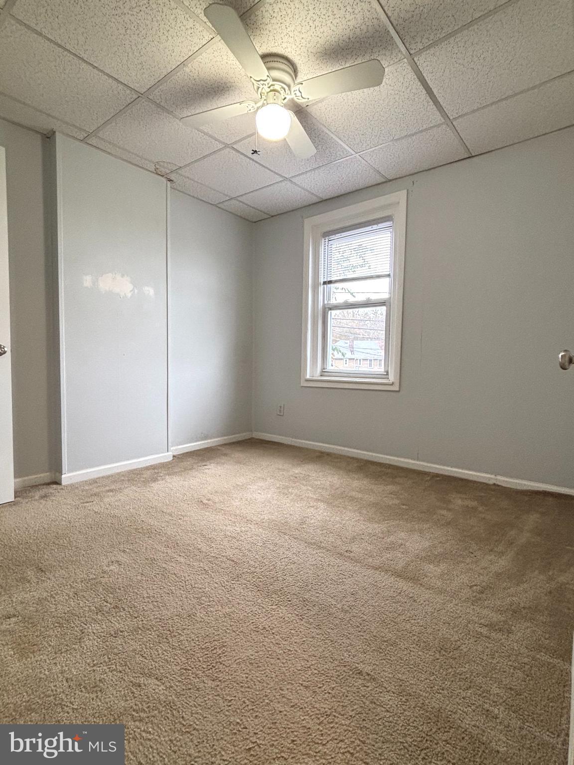 207 New Jersey Road Brooklawn, NJ 08030 - Photo 13 of 14 a view of an empty room with a window