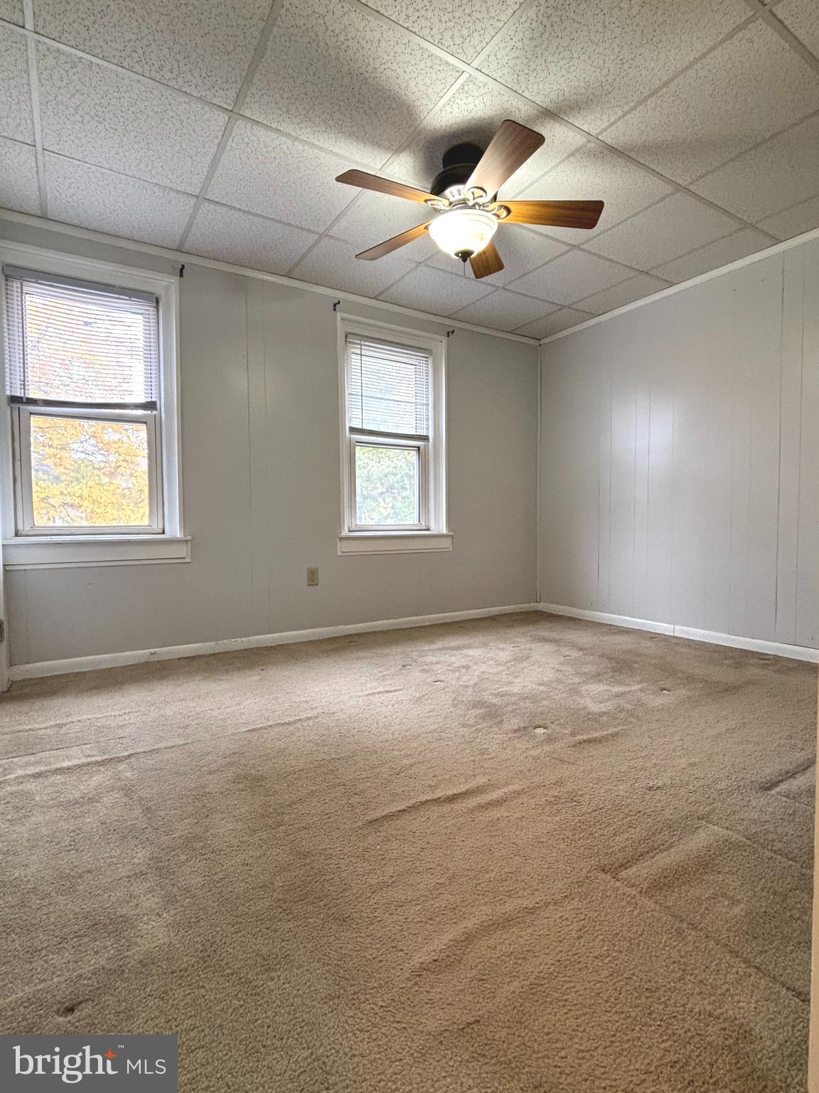 207 New Jersey Road Brooklawn, NJ 08030 - Photo 14 of 14 an empty room with windows and fan