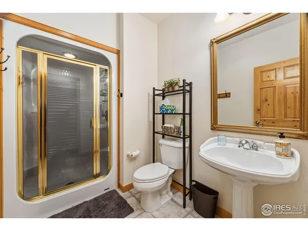 a bedroom with a bed and closet