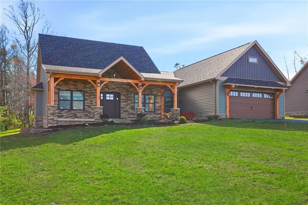 4844 Lucerne Road Indiana, PA 15701 - Photo 1 of 39 a front view of a house with a garden