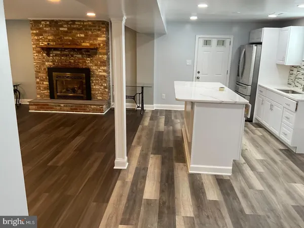 a view of a kitchen from the hallway