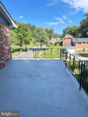 a view of a city street from a balcony