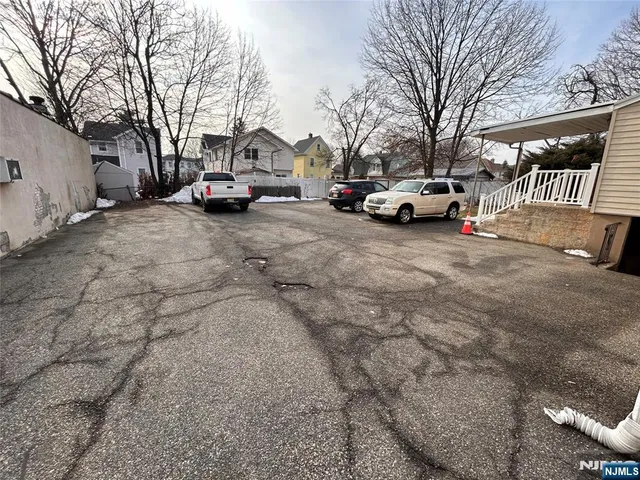 a car parked in front of a house