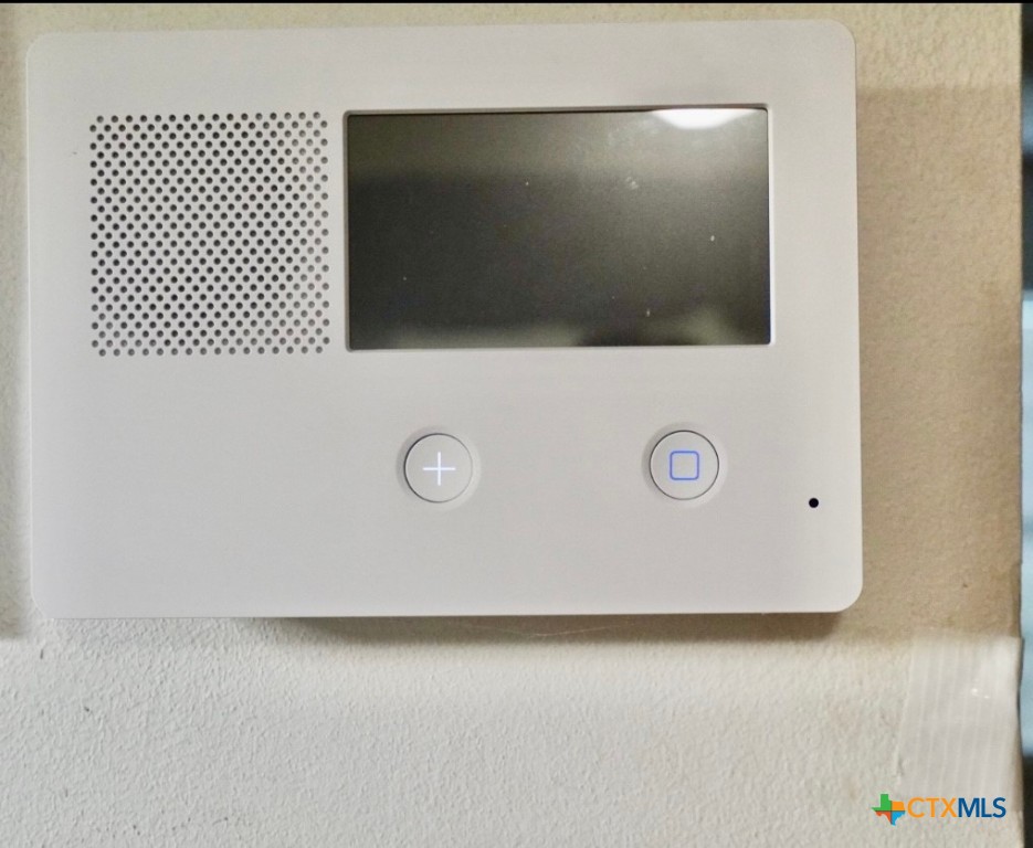 141 Jackson Street Elgin, TX 78621 - Photo 14 of 28 a view of a microwave