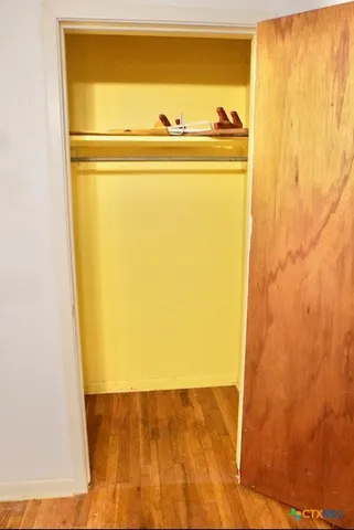 a bathroom with a sink and a window