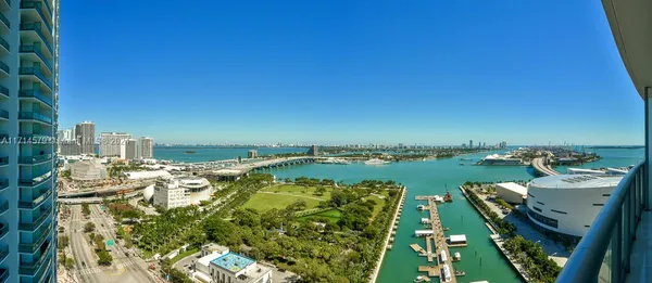 a view of a lake with a city