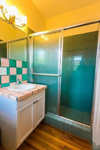 a bathroom with a sink and a mirror