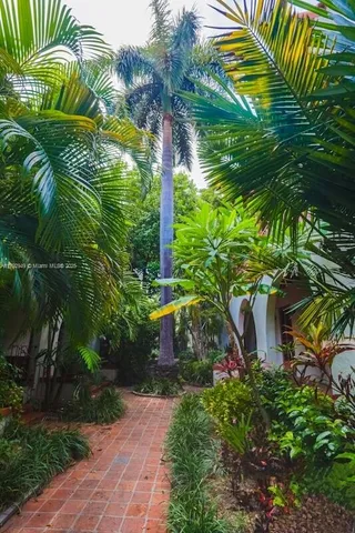 a backyard of a house with lots of green space