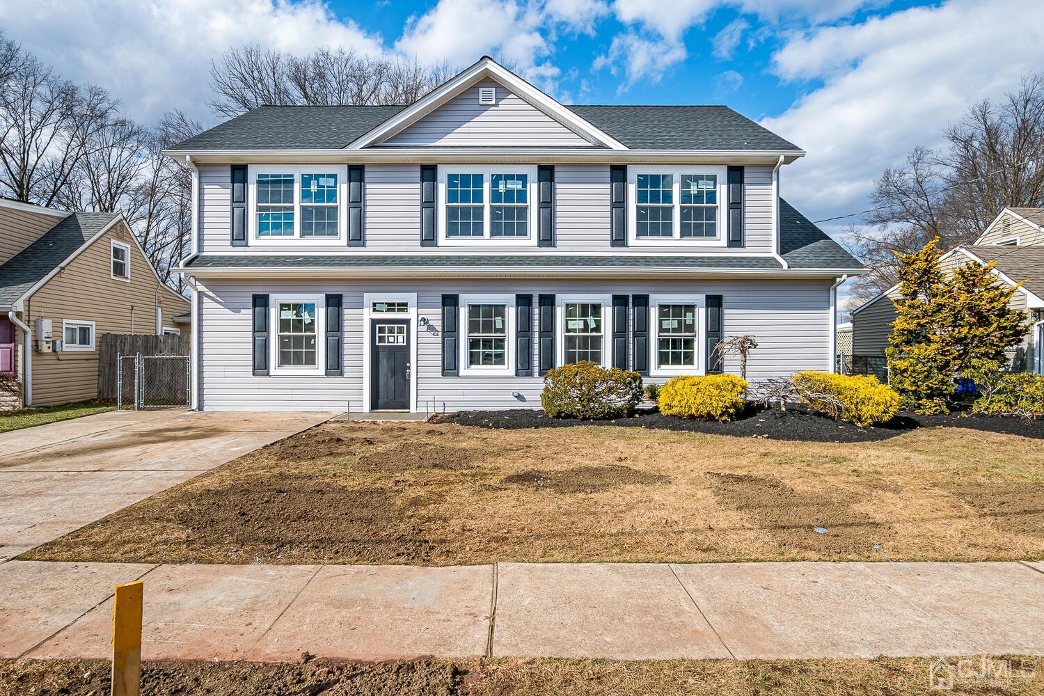 31 Sturgis Road Edison, NJ 08817 - Photo 1 of 35 a front view of a house with a yard