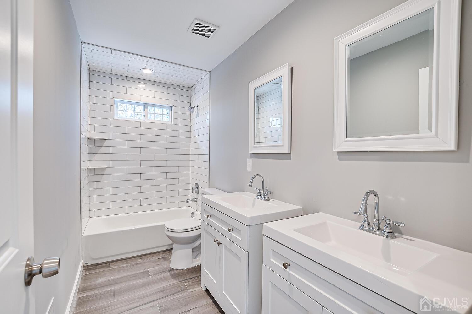 31 Sturgis Road Edison, NJ 08817 - Photo 31 of 35 a bathroom with a sink a toilet and shower