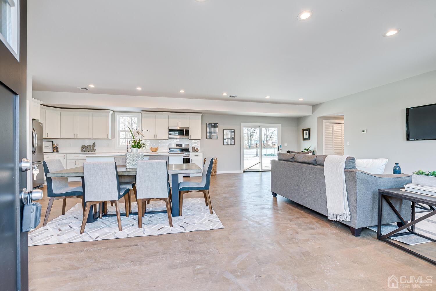 31 Sturgis Road Edison, NJ 08817 - Photo 6 of 35 a view of a dining room with furniture and a kitchen