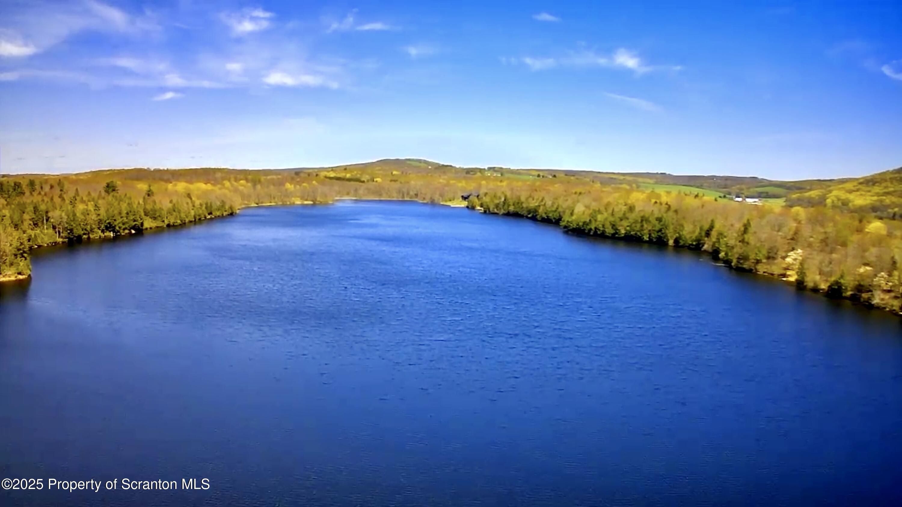 Lot 1 May Road Thompson, PA 18465 - Photo 4 of 11 a view of an ocean and beach