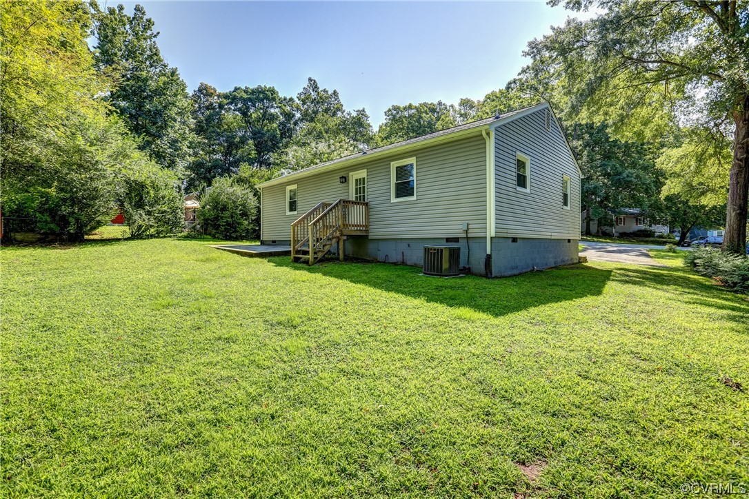 1522 Rayburn Road Richmond, VA 23235 - Photo 33 of 38 a view of a house with backyard and trees