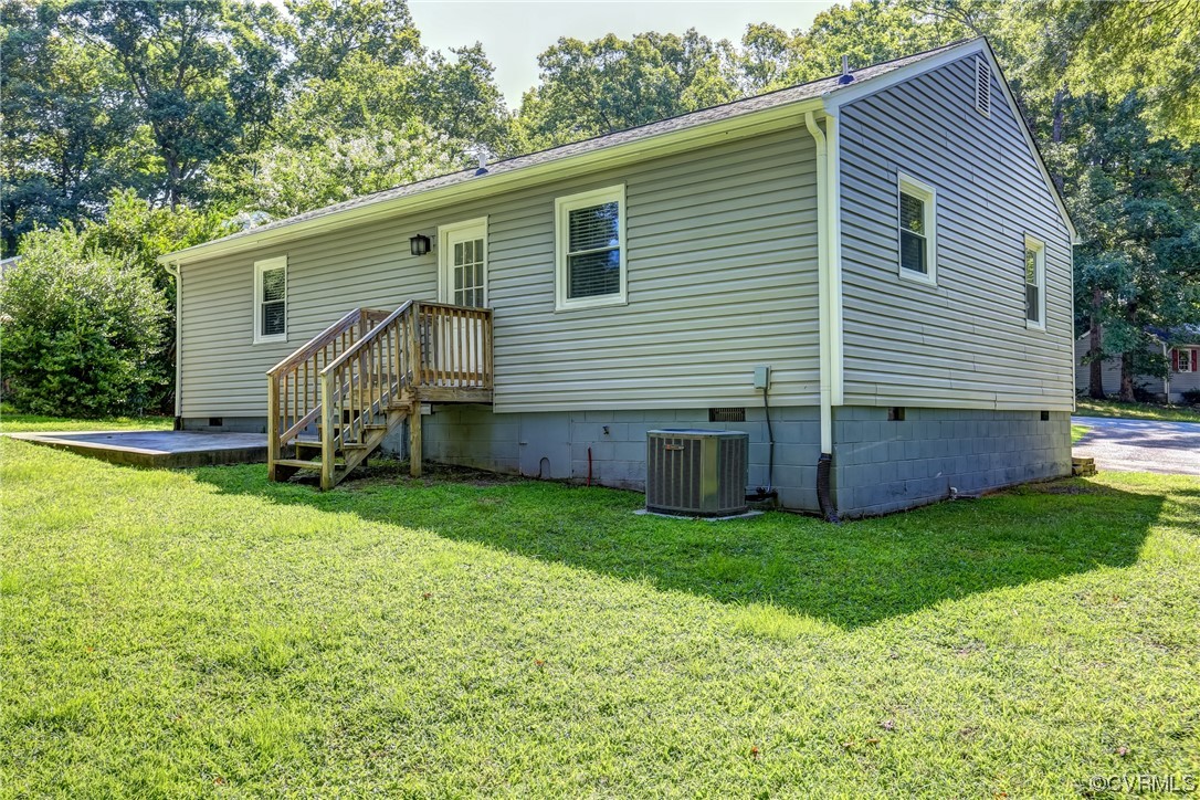 1522 Rayburn Road Richmond, VA 23235 - Photo 34 of 38 a view of a house with a backyard