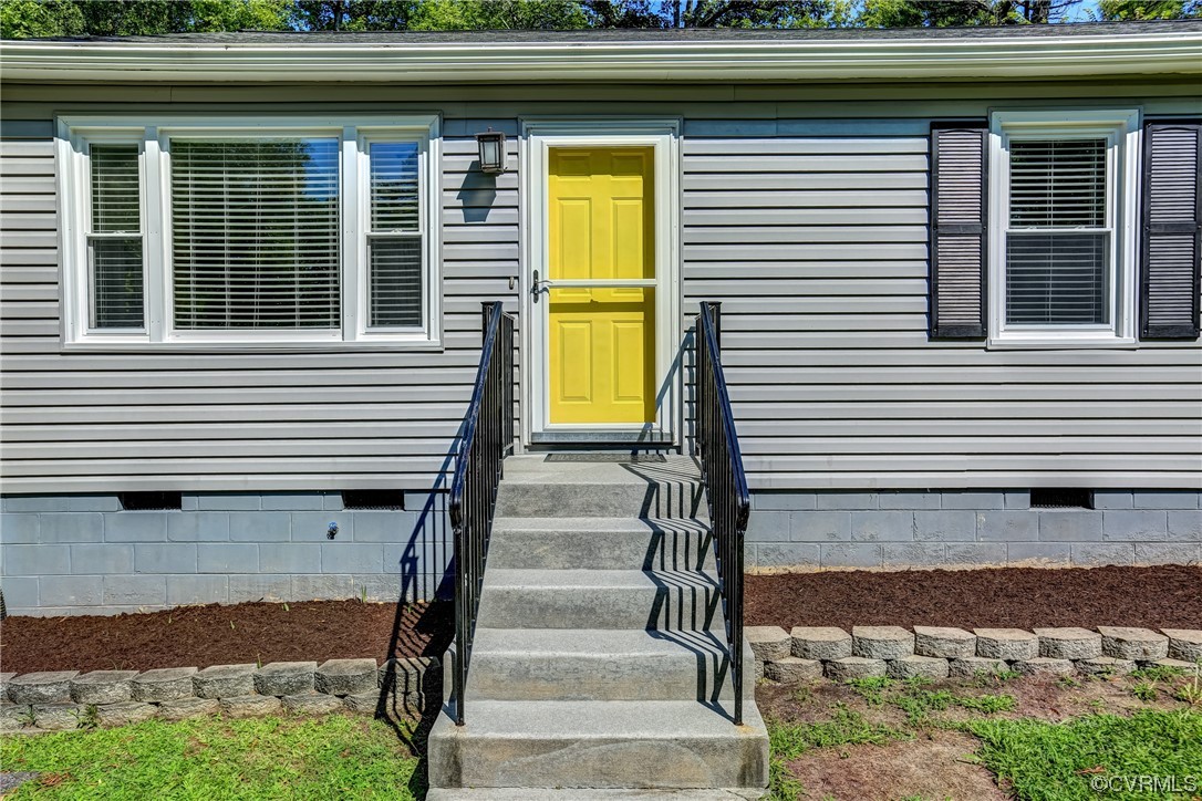 1522 Rayburn Road Richmond, VA 23235 - Photo 9 of 38 a view of a house with a window and stairs