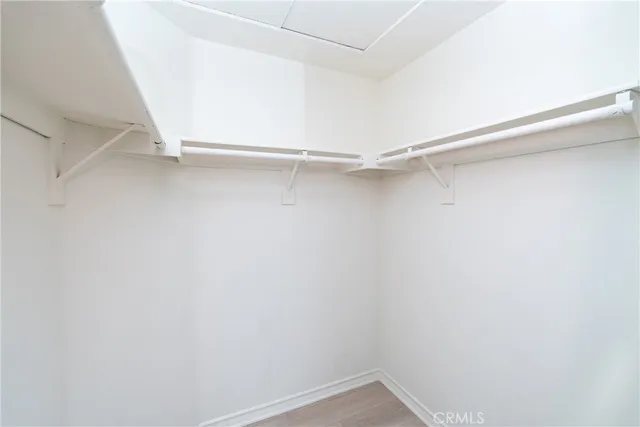 a view of an empty walk in closet