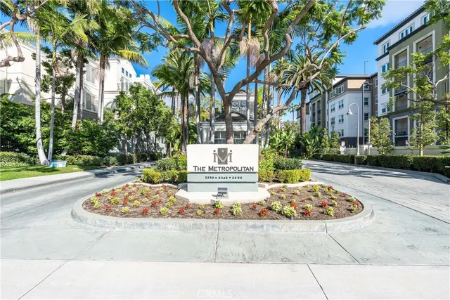 a white bath tub sitting in front of a building
