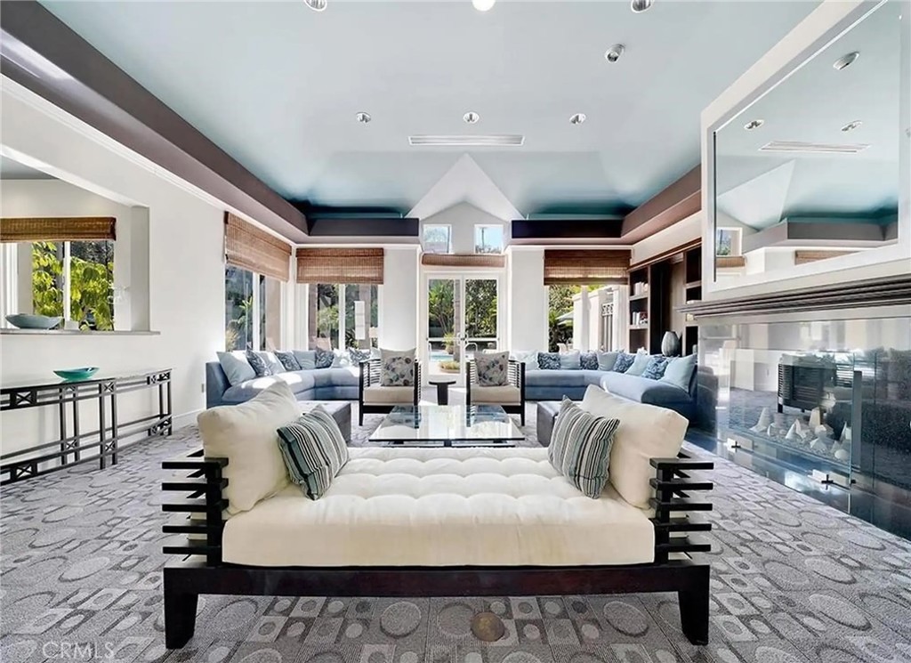 2253 Martin, Unit 416 Irvine, CA 92612 - Photo 22 of 23 a living room with furniture and a large window