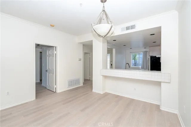 a view of a kitchen and a sink