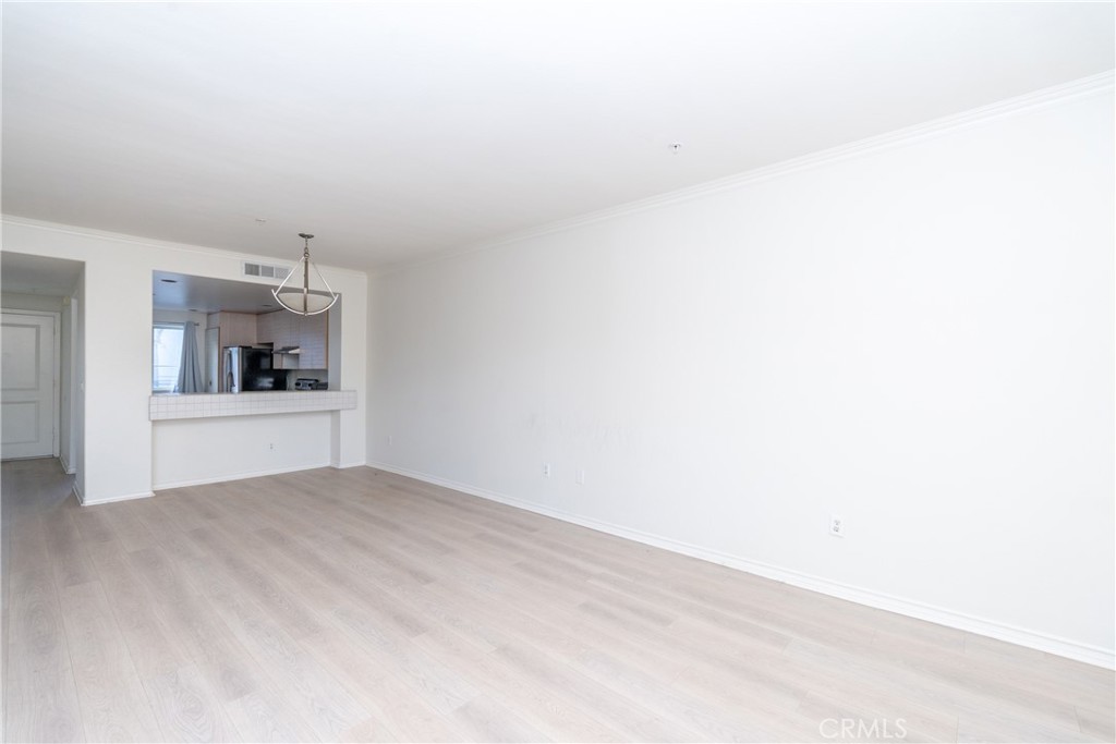 2253 Martin, Unit 416 Irvine, CA 92612 - Photo 7 of 23 a view of a big room with cabinet and cabinet
