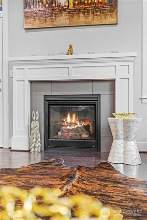 a view of fireplace in livingroom with white walls