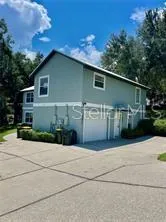 a front view of a house with garage