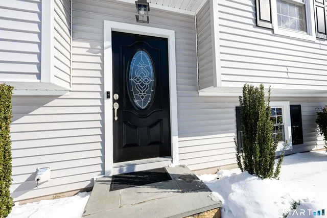 a bathroom with a mirror a sink and a mirror