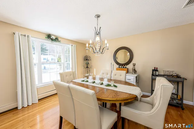 a bedroom with a large bed and a large window