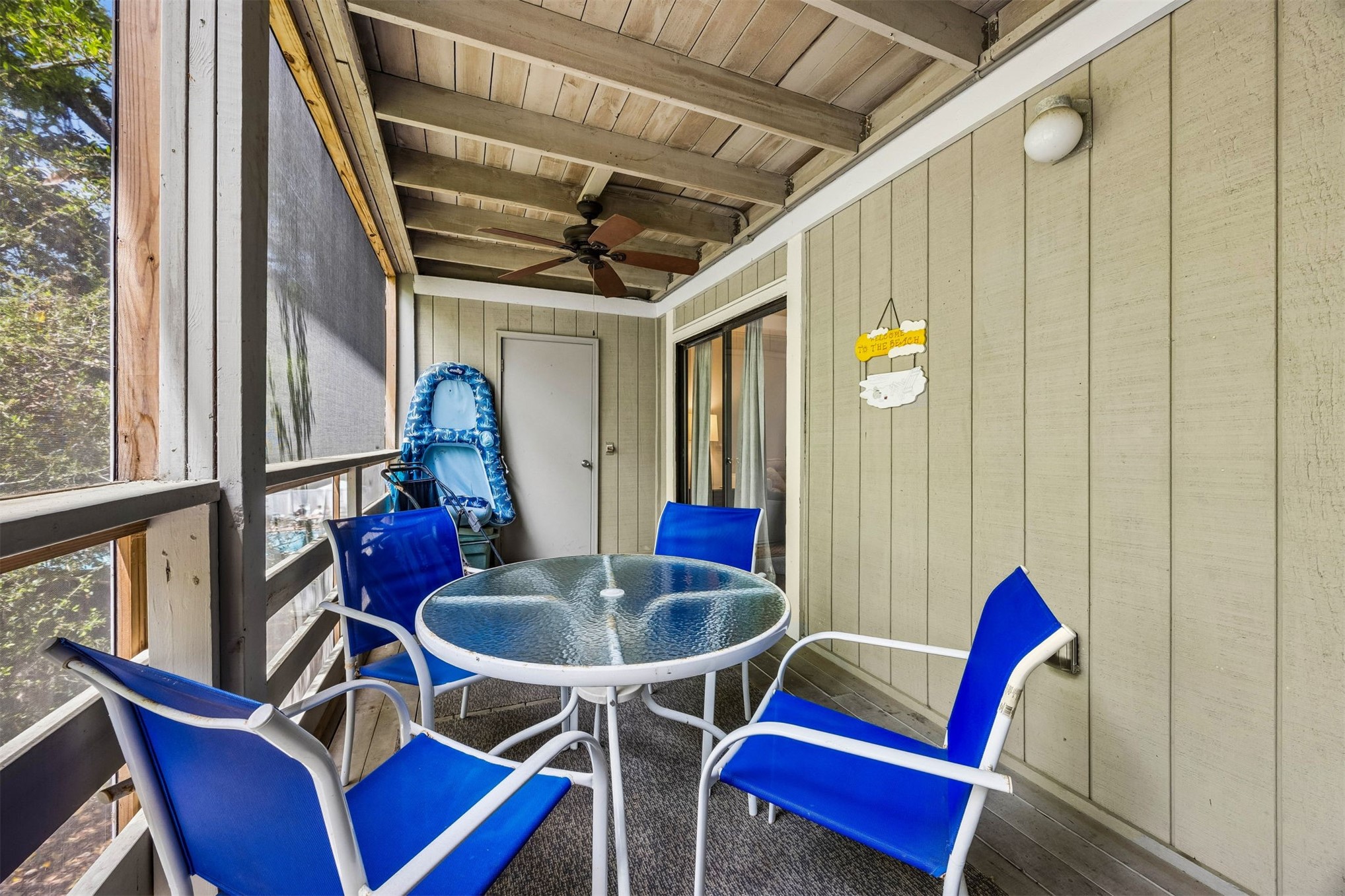 2328 Sadler Road, Unit 1C Fernandina Beach, FL 32034 - Photo 30 of 49 a front view of a house with outdoor seating