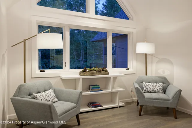 a living room with a couch and a table