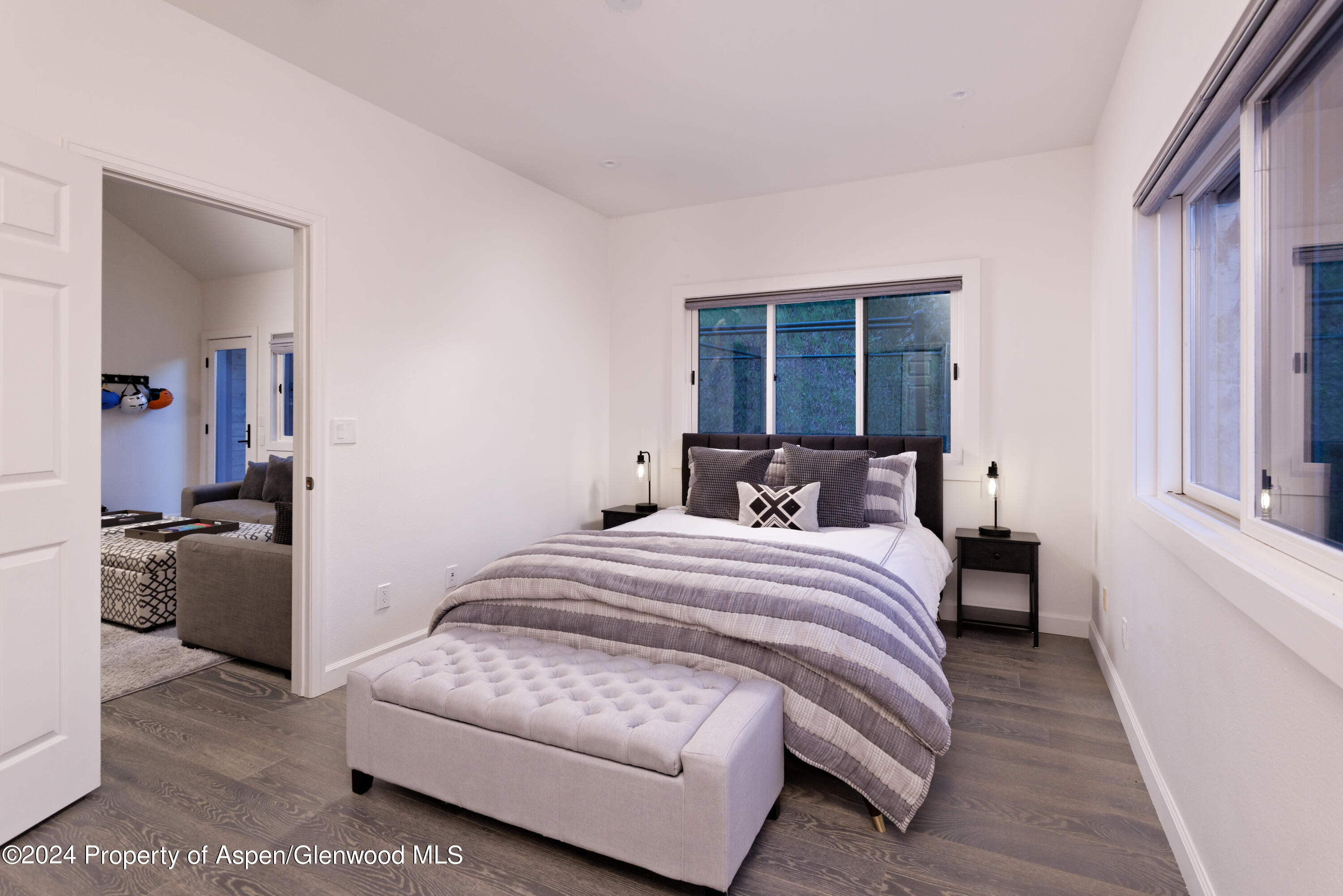 400 Medicine Bow Road Aspen, CO 81611 - Photo 26 of 36 a bedroom with a bed and a large window