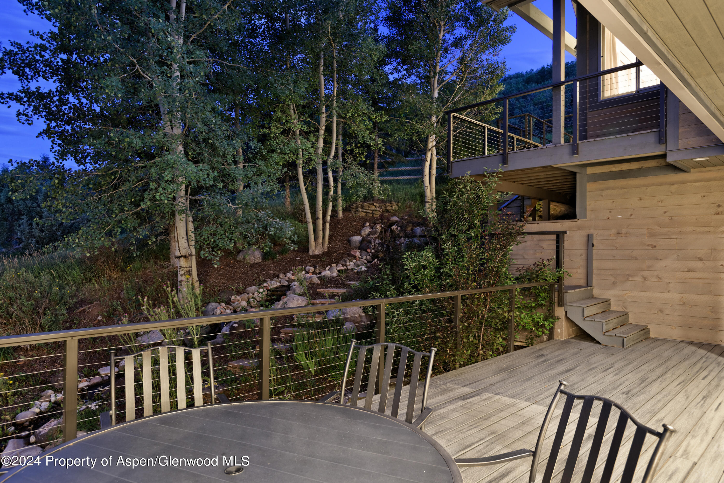 400 Medicine Bow Road Aspen, CO 81611 - Photo 36 of 36 a view of a pathway of a house with wooden fence