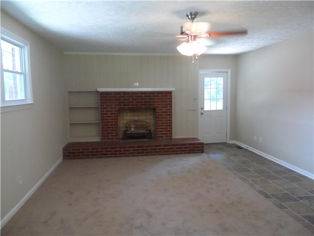 310 Golfview Lane Springfield, TN 37172 - Photo 6 of 12 Bonus room with fireplace, can be used as a 3rd bedroom.