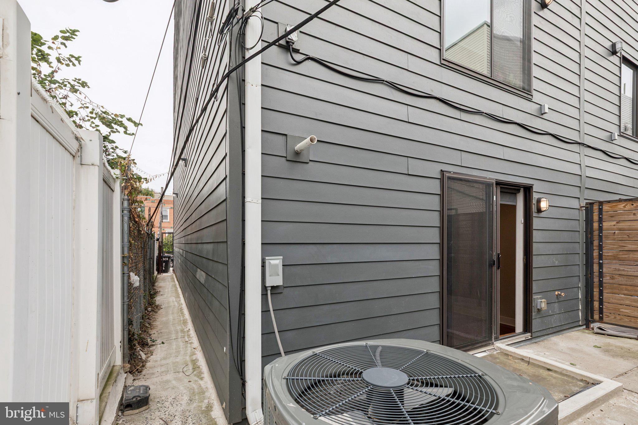 814 North Uber Street, Unit 2 Philadelphia, PA 19130 - Photo 15 of 68 a potted plant sitting in front of a house