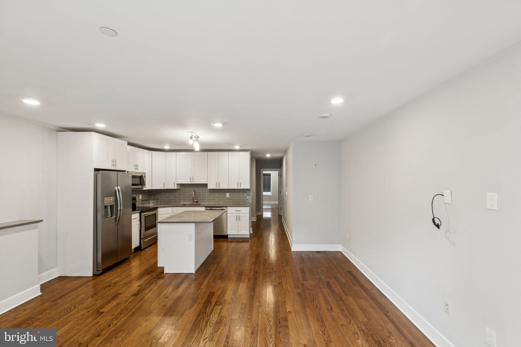 814 North Uber Street, Unit 2 Philadelphia, PA 19130 - Photo 2 of 68 a kitchen with a sink and stainless steel appliances