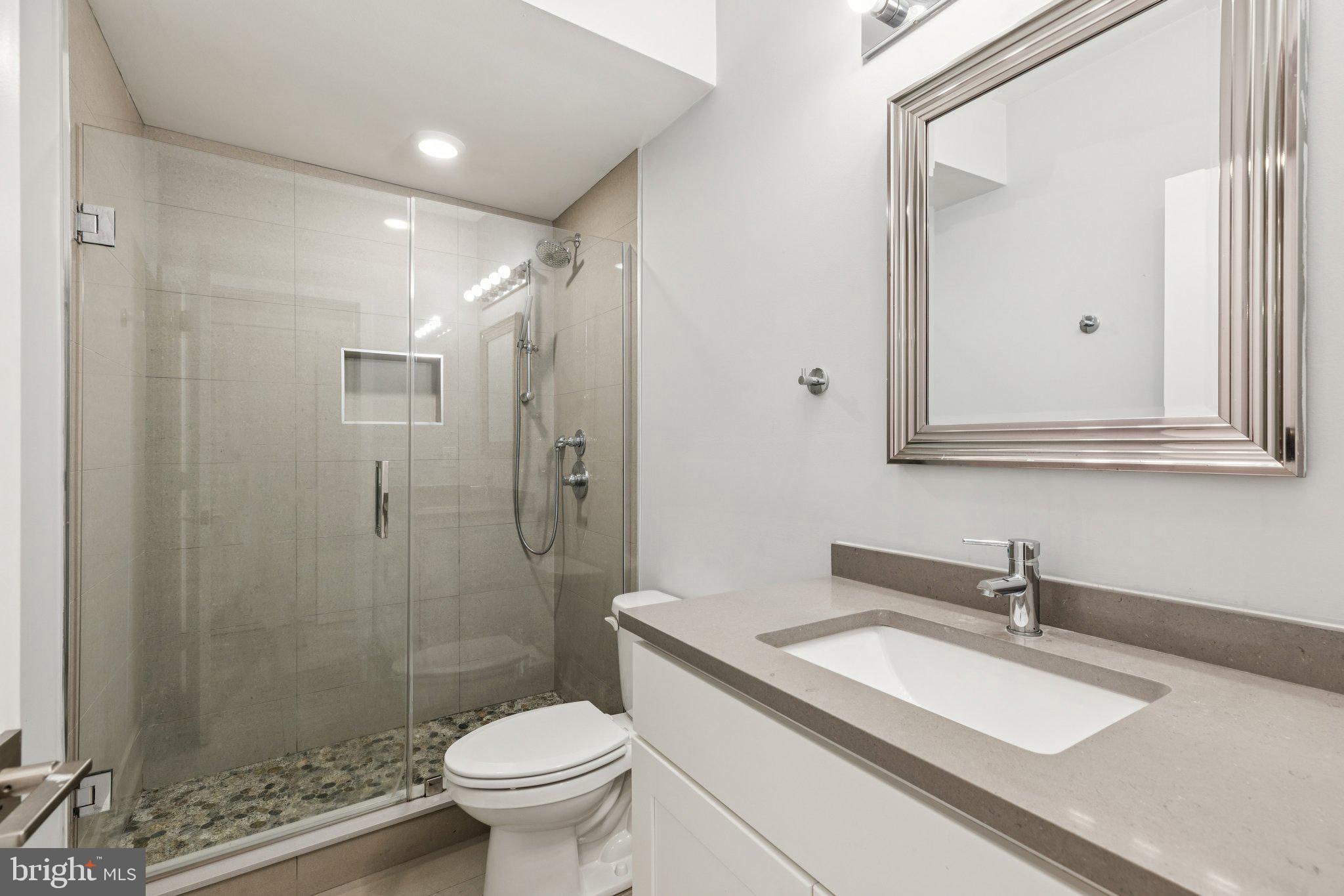 814 North Uber Street, Unit 2 Philadelphia, PA 19130 - Photo 31 of 68 a bathroom with a sink toilet and shower