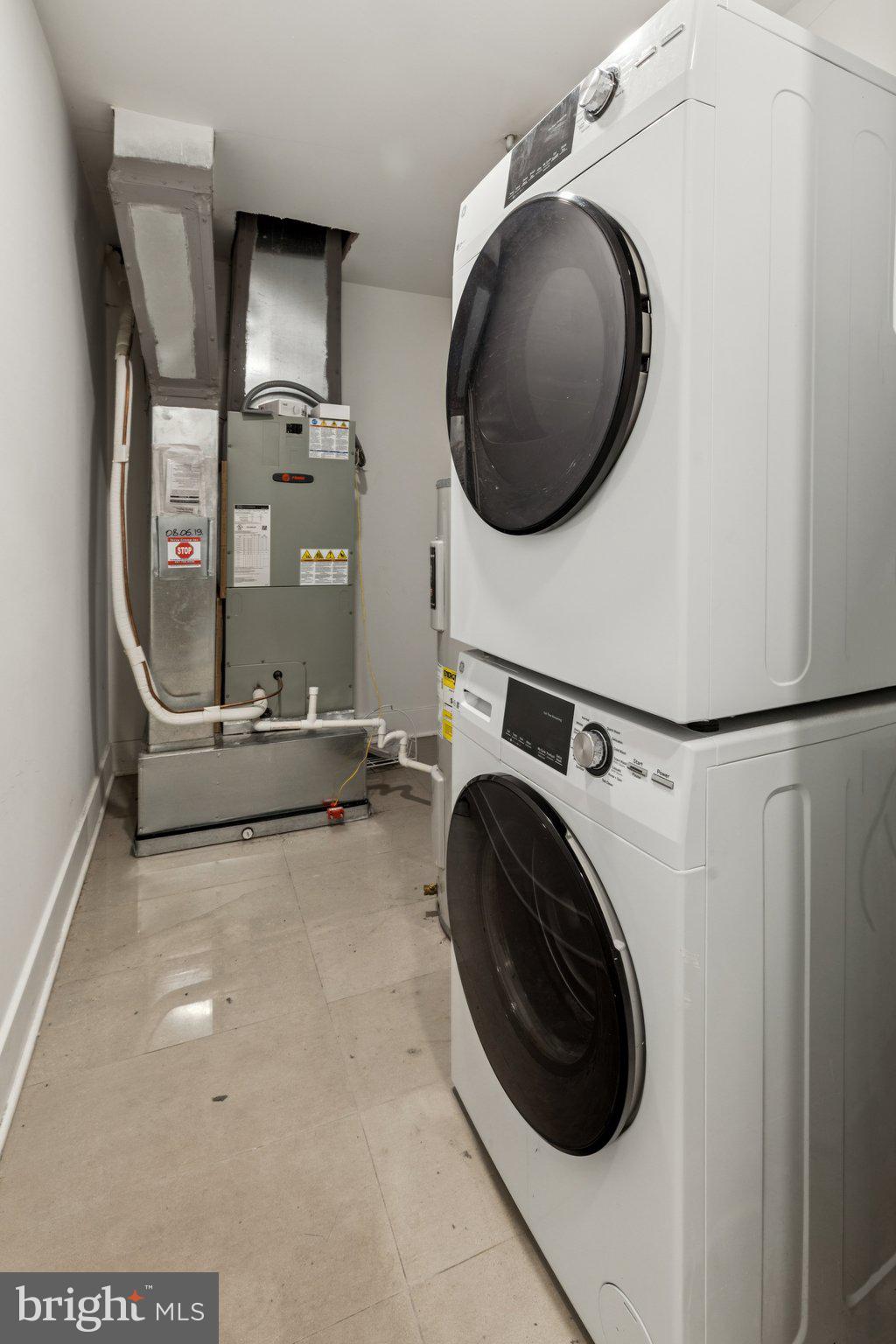 814 North Uber Street, Unit 2 Philadelphia, PA 19130 - Photo 33 of 68 a view of a storage and utility room with washer and dryer