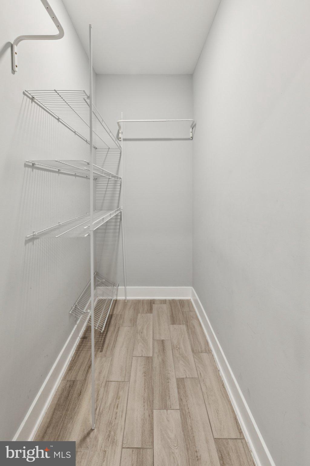 814 North Uber Street, Unit 2 Philadelphia, PA 19130 - Photo 41 of 68 a view of a room with racks on the wall