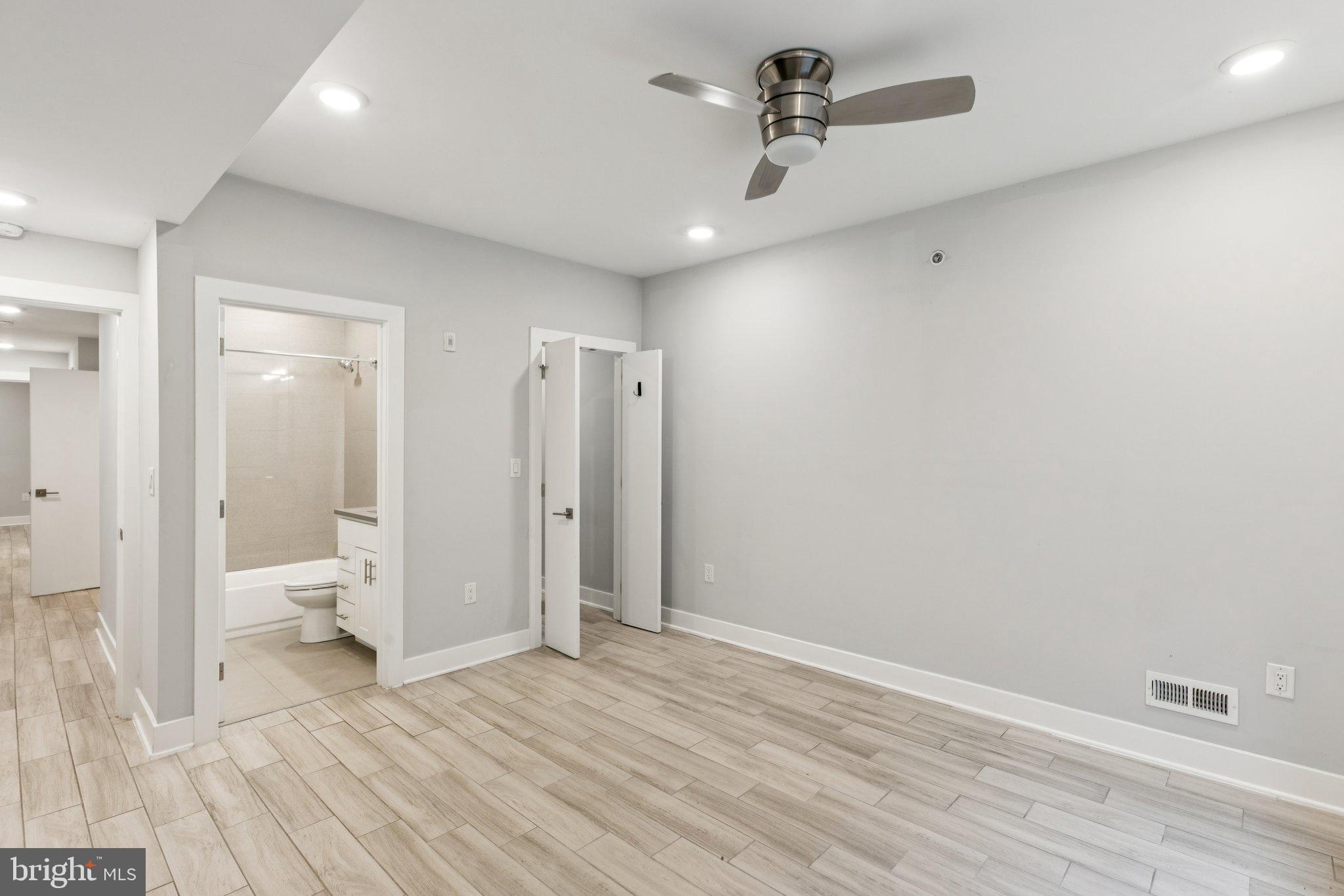 814 North Uber Street, Unit 2 Philadelphia, PA 19130 - Photo 44 of 68 a bathroom with a sink and a mirror