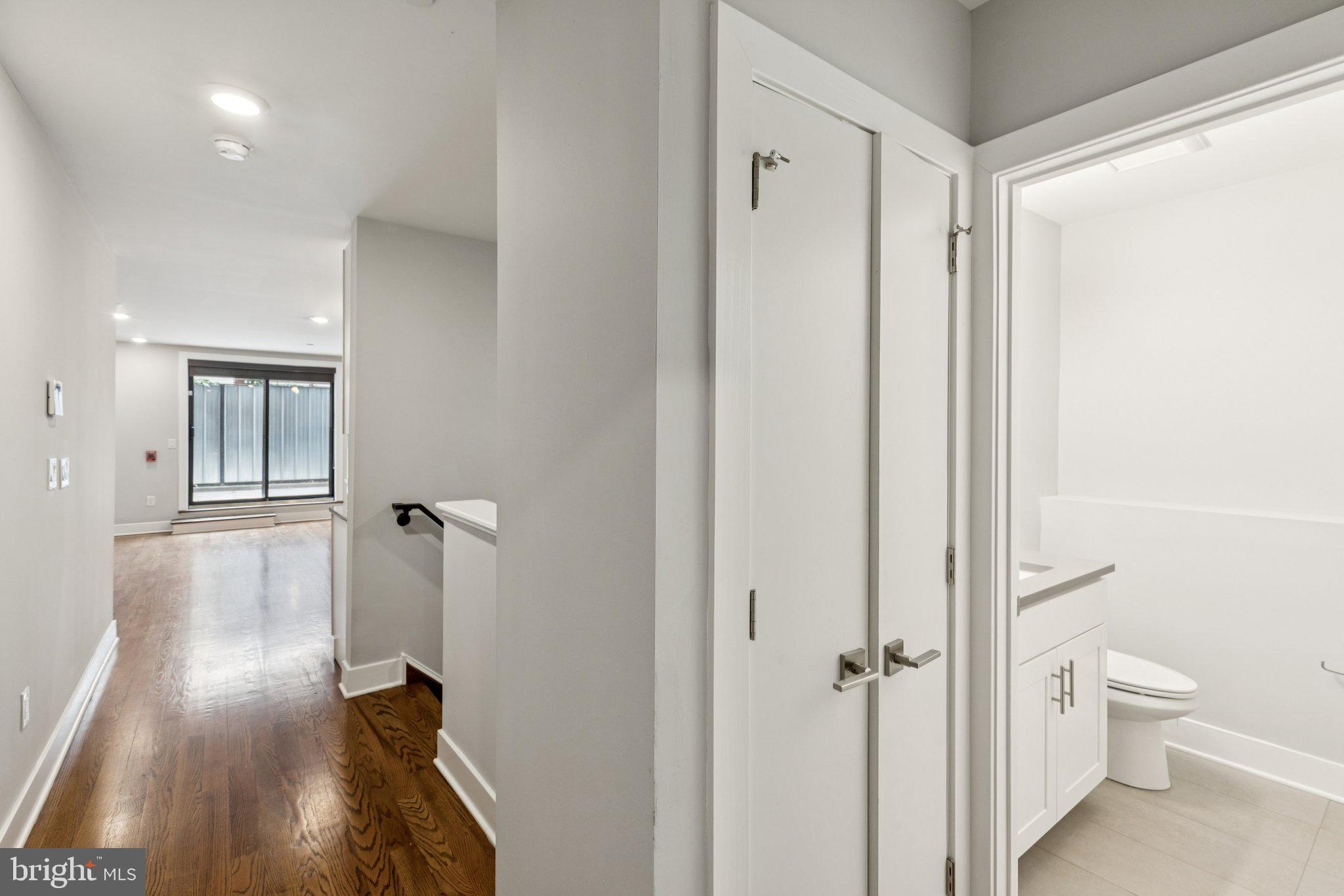 814 North Uber Street, Unit 2 Philadelphia, PA 19130 - Photo 50 of 68 a view of a bathroom with a hardwood floor and a ceiling fan